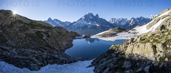 Mountain panorama with water reflection in Lac Blanc