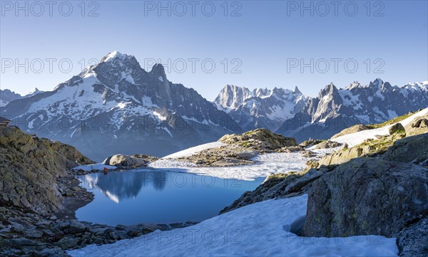 Mountain panorama with water reflection in Lac Blanc