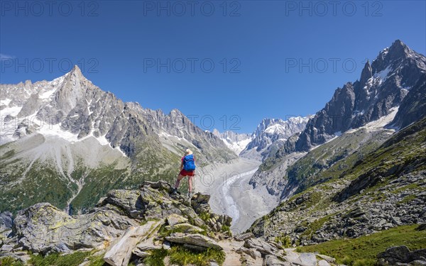 Climber standing on rocks