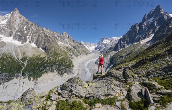 Climber standing on rocks