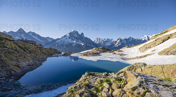 Mountain panorama with water reflection in Lac Blanc