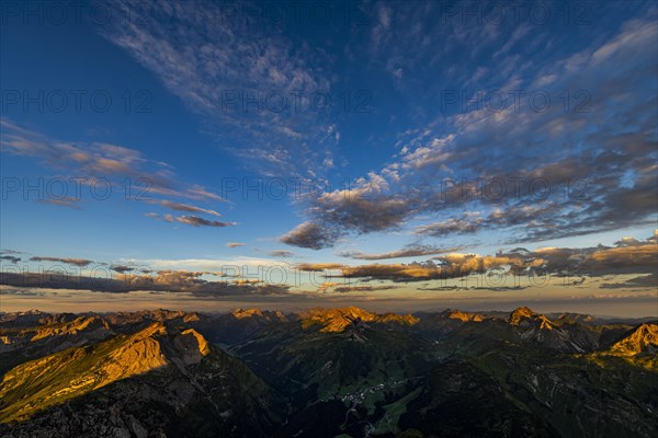 Sunrise with clouds over Allgaeu mountains