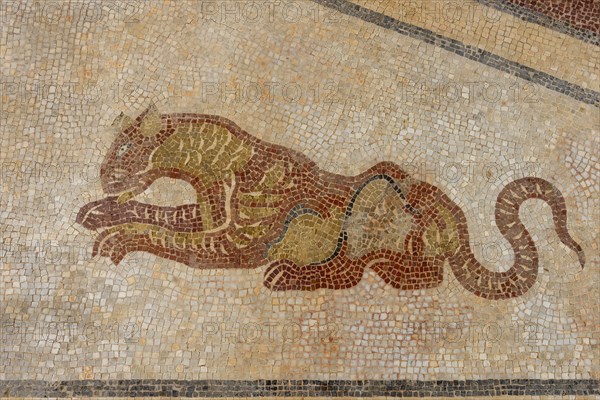 Mythical animals decorating walls in Estoi Palace garden