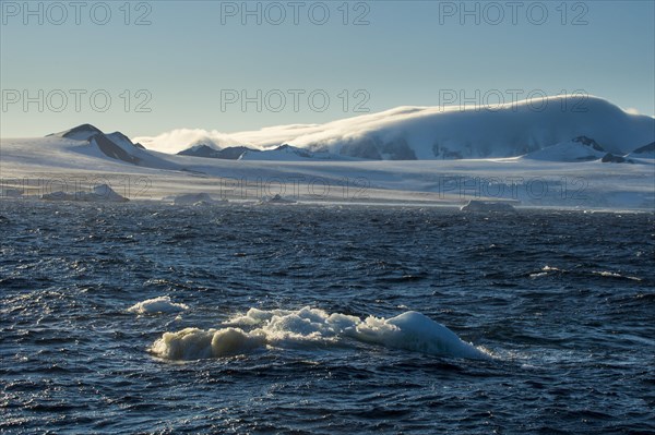 Little icebergs loating before the huge glaciers on Tabarin Peninsula