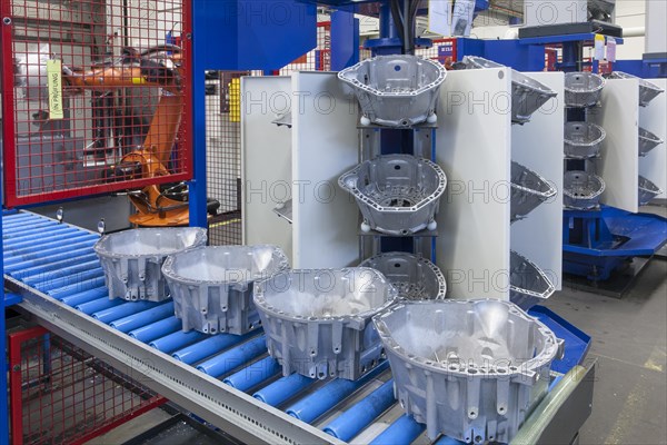 Car parts on a conveyor belt in a car parts factory