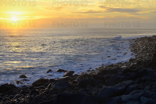 Sunset with clouds over the Pacific Ocean