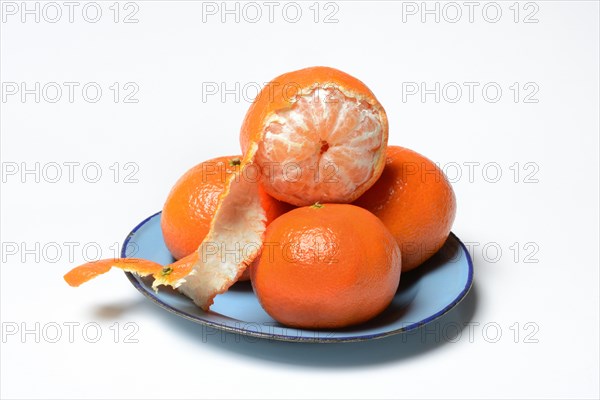 Clementines on plate