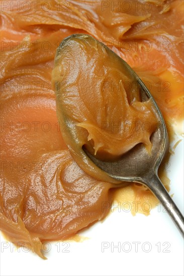 Salted caramel cream with spoon