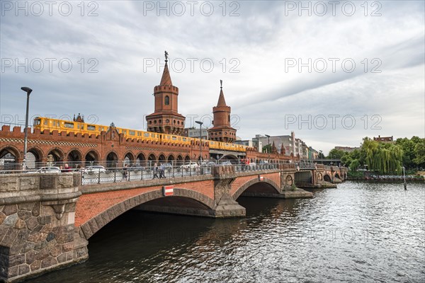 Yellow S-Bahn on the Oberbaum Bridge between Kreuzberg and Friedrichshain