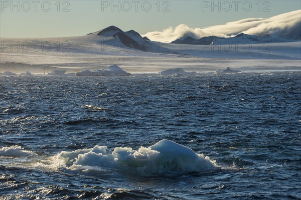 Little icebergs loating before the huge glaciers on Tabarin Peninsula