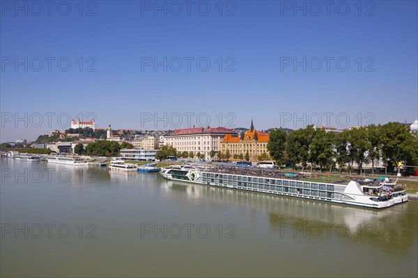 Landing stage for Danube cruise ships with a view to Bratislava Castle