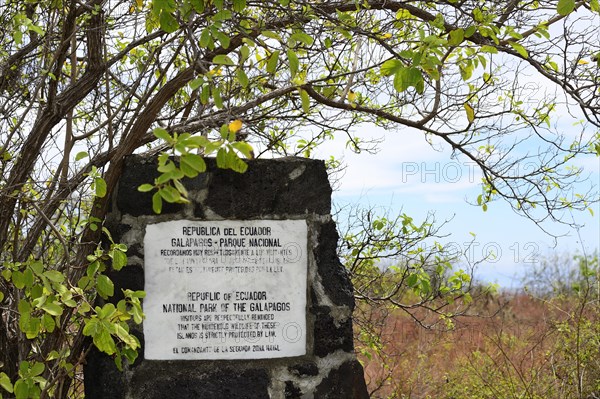 Old marble plaque with admonition to tourists