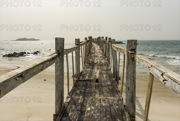 Old wooden pier in the Tokeh Beach