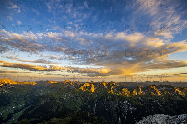 Sunrise with clouds over Allgaeu mountains