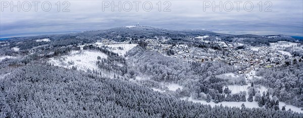 Aerial view over the snow-covered Taunus with Oberreifenberg