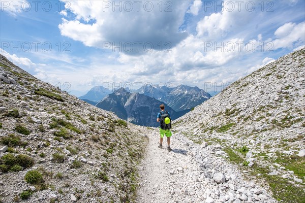 Mountaineers hiking on the via ferrata Mittenwalder Hoehenweg