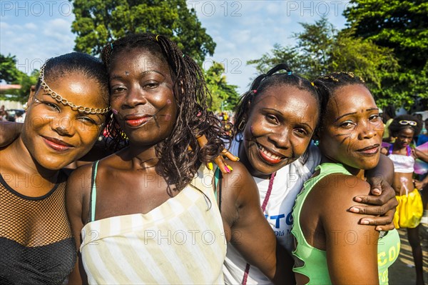 Girls posing at the Carneval in the town of Sao Tome