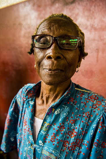 Old market woman in the central Market in the city of Sao Tome