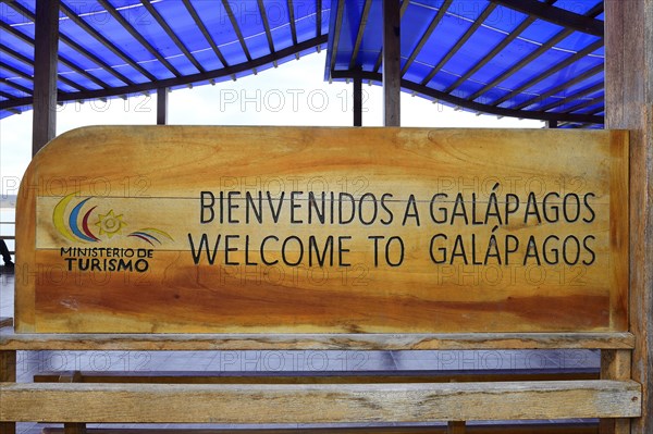 Sign at the ferry terminal Baltra