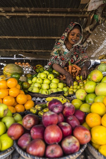 S ales woman on her fruit stall