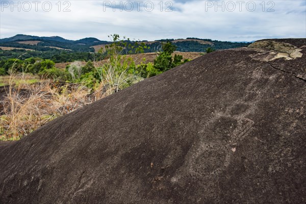 Prehistoric rock carvings in the Unesco world heritage sight Lope national park