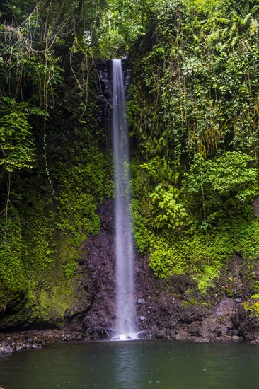 Waterfall cascade Bombaim in the jungle interior of Sao Tome