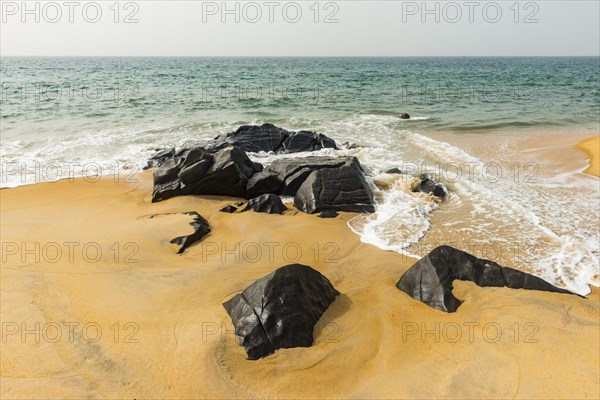 Rocks on a pretty beach in Robertsport