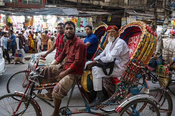 Completely with rickshaws overcrowded street in the center of Dhaka