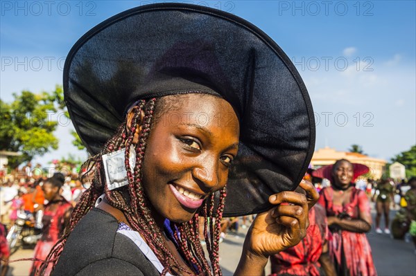 Girl posing at the Carneval in the town of Sao Tome