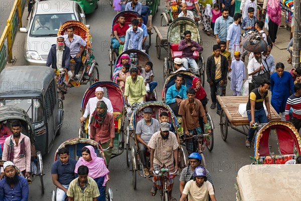 Completely with rickshaws overcrowded street in the center of Dhaka