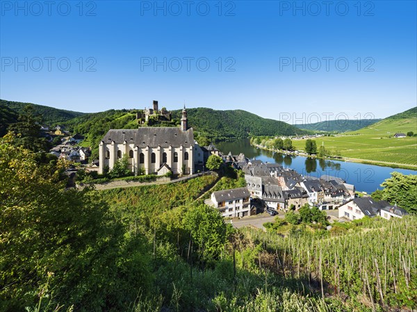 Winegrowing village Beilstein at the river Moselle with Carmelite church and castle ruin Metternich surrounded by vineyards