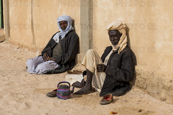 Old man before a mosque in a village at Ounianga kebir part of the the Unesco sight Ounianga lakes