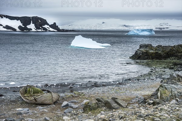 Old cargo boat on the shores of Half moon island