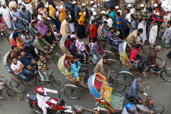 Completely with rickshaws overcrowded street in the center of Dhaka