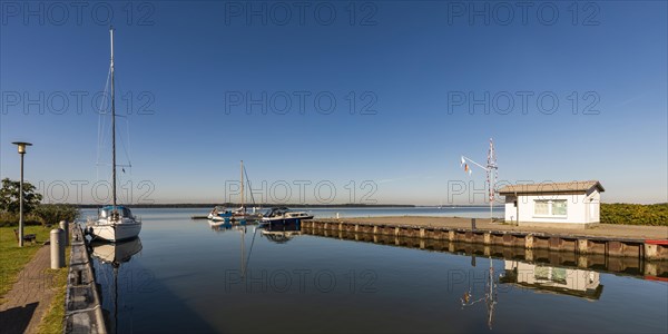 Sport boats in the harbour in front of Peenestrom