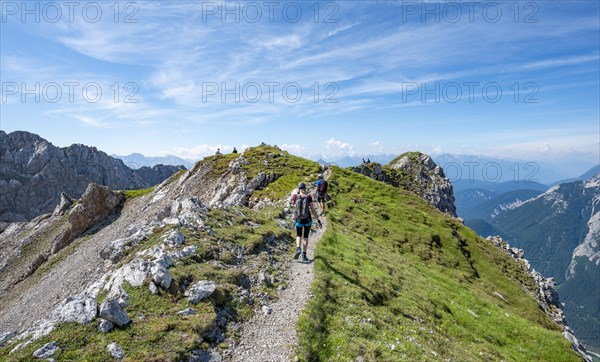 Mountaineers hiking on a ridge