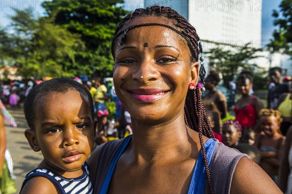 Girl posing at the Carneval in the town of Sao Tome