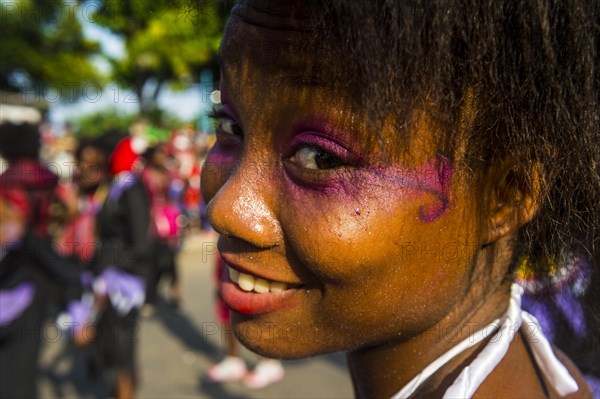 Girl posing at the Carneval in the town of Sao Tome