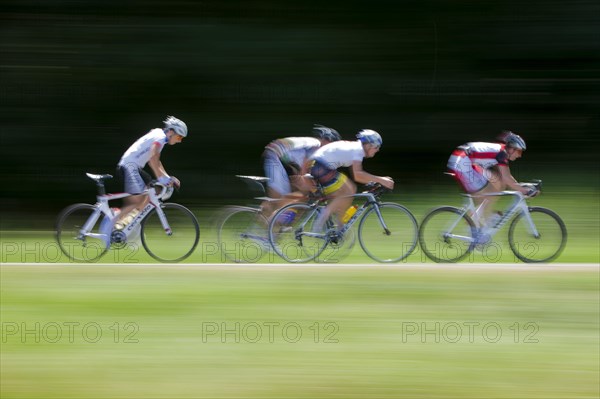 Blurred cyclists