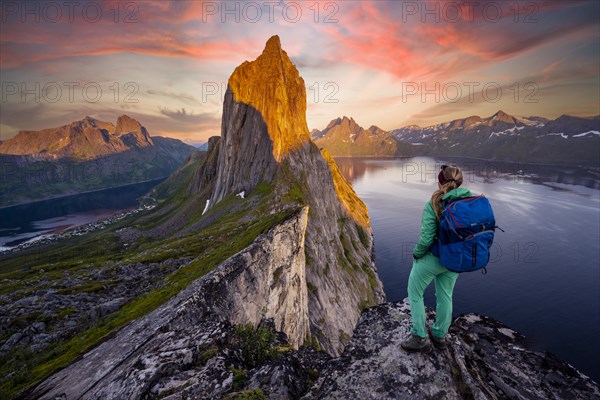 Hiker looks at landscape