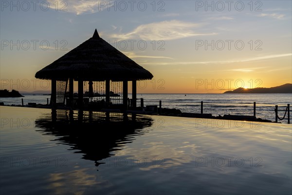 Sunset poolside gazebo