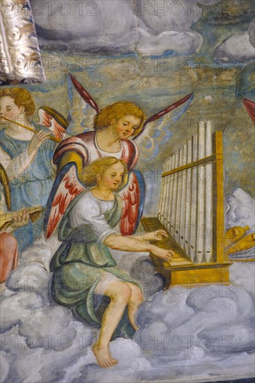 Fresco of angels playing music