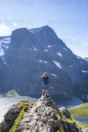 Hiker on the way to Innerdalstarnet