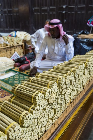 Man selling chewing sticks