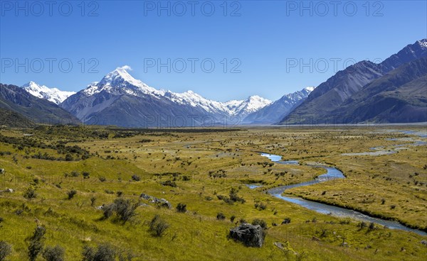 View of Mount Cook and snow covered mountains with Tasman River