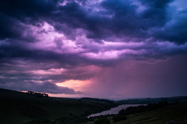 The colors of the storm with thunderbolts on night sky in Brecon Beacons National Park