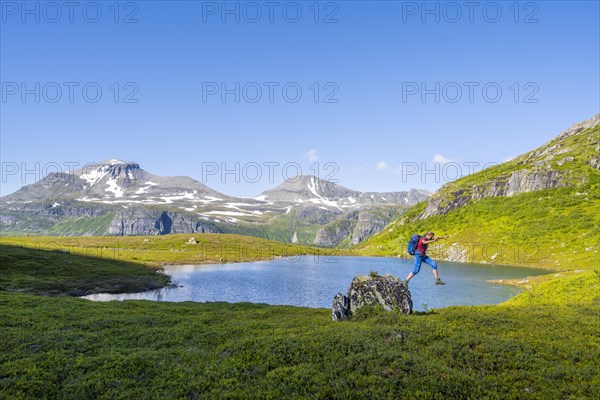 Hiker sprinting from rocks