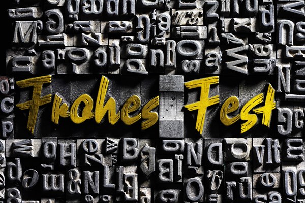 Old lead letters with golden writing