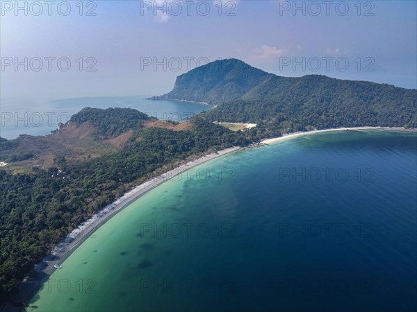 Aerial of a white sand beach on smart island