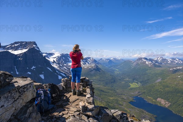 Hiking at the peak of Innerdalstarnet